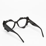 Oscar Mamooi / Innocence / Black