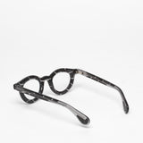 Theo / Sassi / 001 Astrakhan + Transparent Graphite Grey