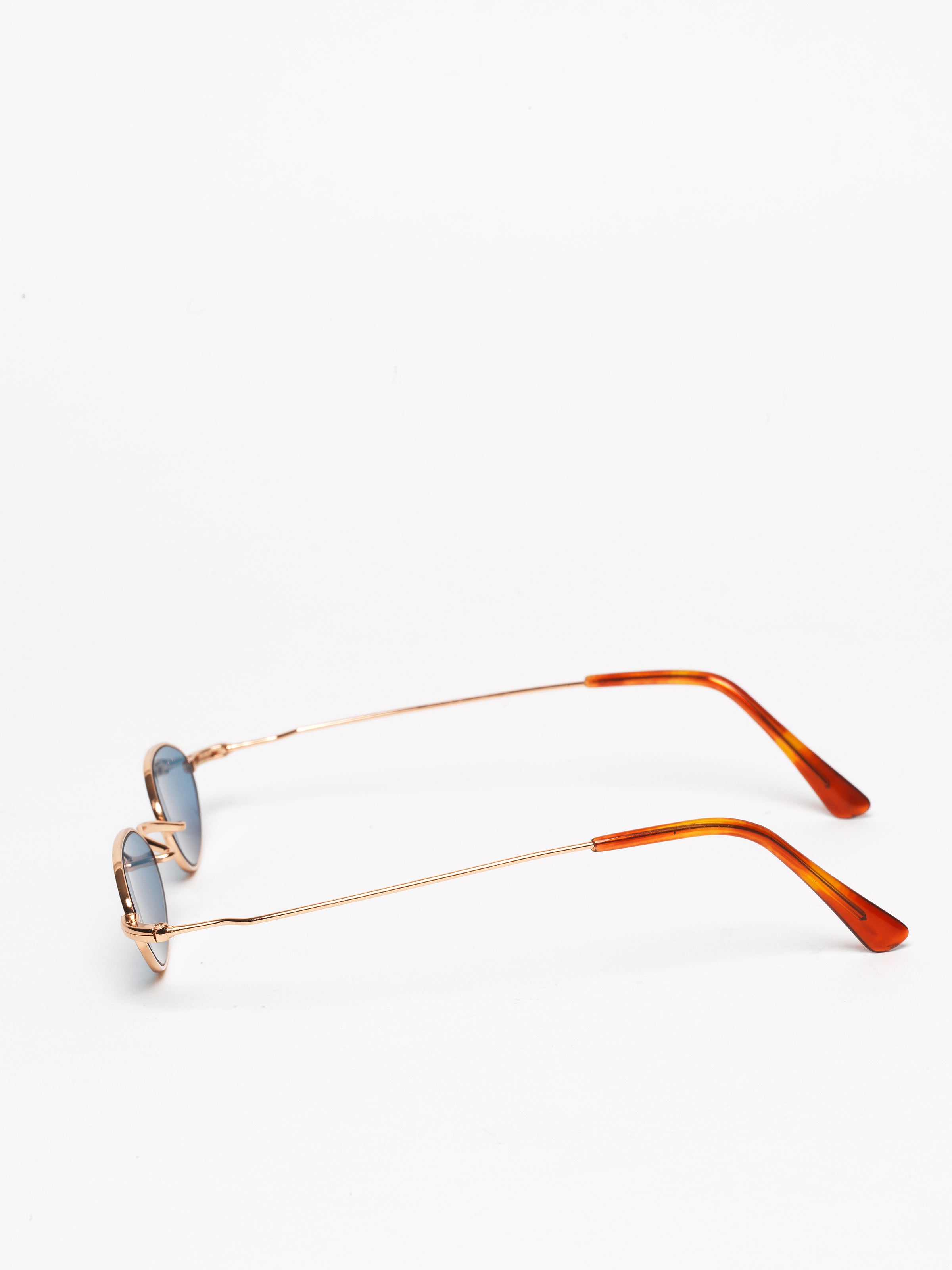 Gouverneur Audigier The Reimagined Tiny Oval Rose Gold with Azure Blue Lenses sunglasses, side profile