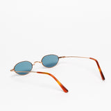 Gouverneur Audigier The Reimagined Tiny Oval Rose Gold with Azure Blue Lenses sunglasses, rear three-quarter view