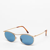 Gouverneur Audigier The Nouvelle Vague Yellow Gold with Riviera Blue Lenses sunglasses, three-quarter view