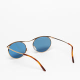 Gouverneur Audigier The Nouvelle Vague Yellow Gold with Riviera Blue Lenses sunglasses, rear three-quarter view