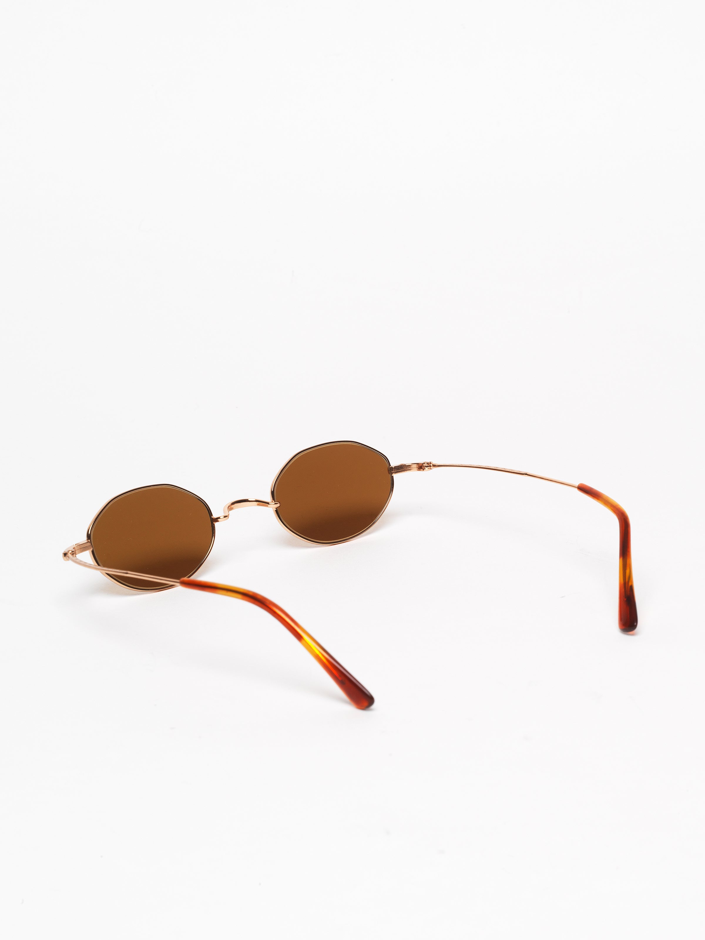 Gouverneur Audigier The Reimagined Oval Rose Gold with Warm Brown Lenses sunglasses, rear three-quarter view