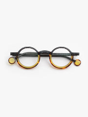Theo / Altalena / 003 Pixel Black Cognac and Cigars Transparent Mustard